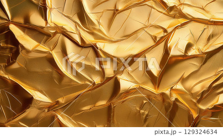 Shimmering gold foil texture with intricate details and soft highlights 129324634