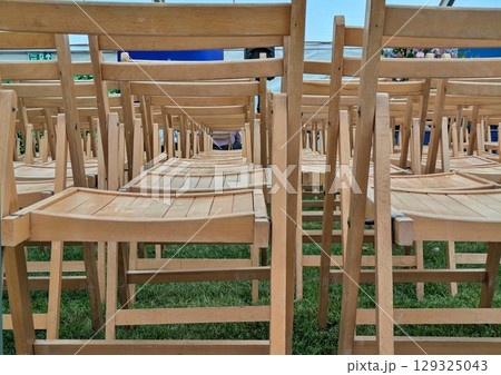 Empty chairs in a marquee Empty chairs in a marquee 129325043