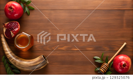 Celebrating harvest traditions with pomegranates, honey, and a shofar on a wooden table Celebrating harvest traditions with pomegranates, honey, and a shofar on a wooden table 129325076