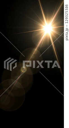Sun Flare With Vertical Composition and Lens Reflections Depicting Optical Motion and Atmospheric Contrast 129325386
