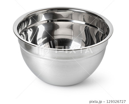 Shiny stainless steel mixing bowl on white surface Shiny stainless steel mixing bowl on white surface 129326727