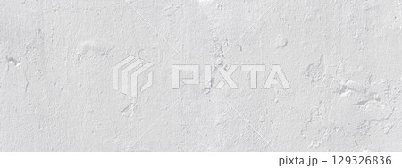 White concrete wall texture showing signs of age and wear White concrete wall texture showing signs of age and wear 129326836