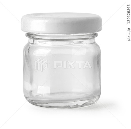 Small empty glass jar with white lid isolated on white background 129326868