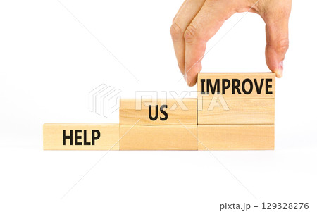 Help us improve symbol. Concept words Help us improve on beautiful wooden blocks. Beautiful white table white background. Businessman hand. Business motivational help us improve concept. Copy space. Help us improve symbol. Concept words Help us improve on beautiful wooden blocks. Beautiful white table white background. Businessman hand. Business motivational help us improve concept. Copy space. 129328276