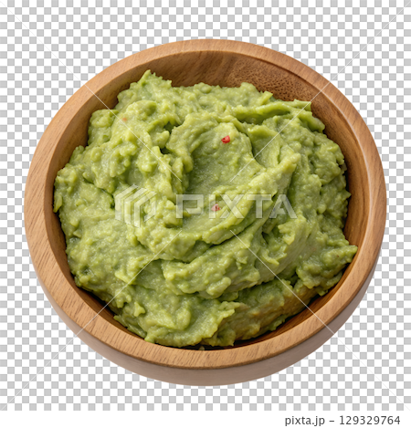 Fresh guacamole in rustic wooden bowl, creamy avocado dip isolated, mexican cuisine concept Fresh guacamole in rustic wooden bowl, creamy avocado dip isolated, mexican cuisine concept 129329764