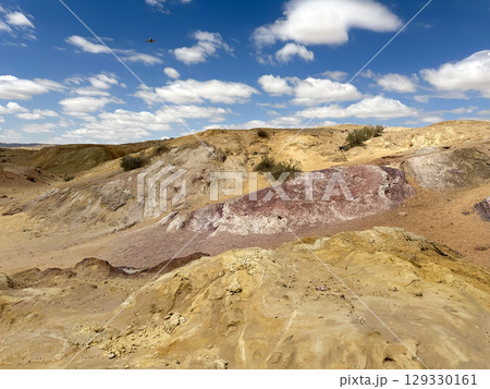 Kholot Tsivoniyim - mountains and dunes of multi-colored sand Kholot Tsivoniyim - mountains and dunes of multi-colored sand 129330161