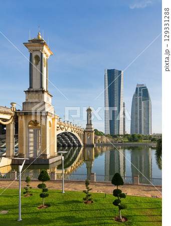 Seri Gemilang Bridge and modern skyline reflected in Putrajaya Lake, Putrajaya, Malaysia Seri Gemilang Bridge and modern skyline reflected in Putrajaya Lake, Putrajaya, Malaysia 129331288