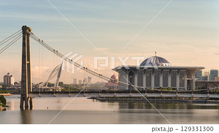 Seri Wawasan Bridge and Tuanku Mizan Zainal Abidin Mosque at golden hour in Putrajaya, Malaysia 129331300