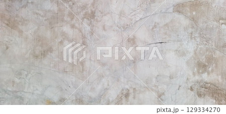 Abstract textured concrete wall with cracks and stains 129334270