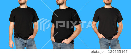 Man displays three black T-shirt styles on blue backdrop 129335165
