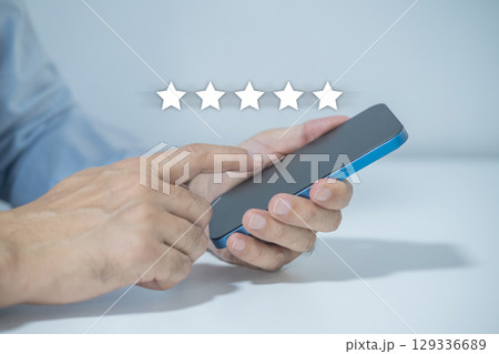 Mobile phone customers give 5 star satisfaction rating. 129336689