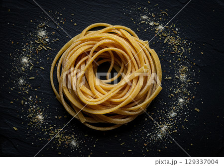 Delicious Dried Pasta Nest with Herbs and Spices 129337004