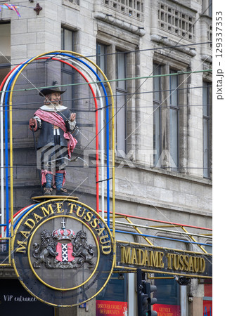 Madame Tussauds wax museum with exhibition of wax figures of famous celebrities, on Dam Square in Amsterdam, Netherlands Madame Tussauds wax museum with exhibition of wax figures of famous celebrities, on Dam Square in Amsterdam, Netherlands 129337353