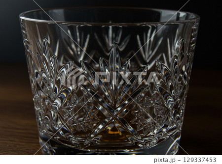 Crystal Whiskey Glass on Wooden Table 129337453