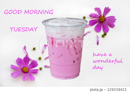 good morning tuesday have a wonderful day message card with pink milks cold drinks and cosmos flowers  129338421