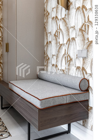 Modern Entryway Bench with Cushion and Patterned Wallpaper 129338638