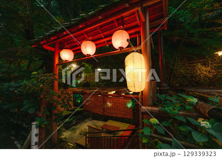 Kawadoko Dining with Traditional Yellow Lanterns in Kyoto Summer Evening Kawadoko Dining with Traditional Yellow Lanterns in Kyoto Summer Evening 129339323