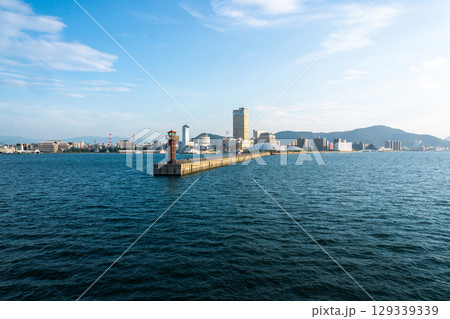 View of Takamatsu Port and the lighthouse from the sea at sunset 129339339