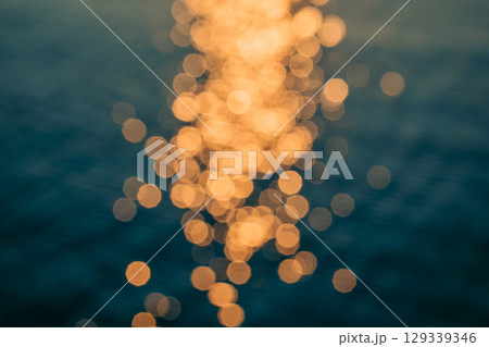 Golden Sunset Bokeh Reflections on the Sea Golden Sunset Bokeh Reflections on the Sea 129339346