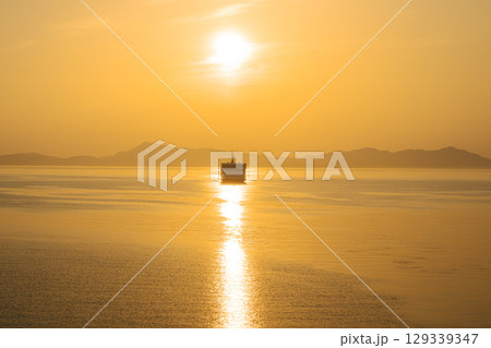 Ferry at Sunset over the Setouchi Sea, Japan 129339347