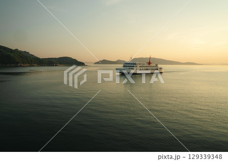 Ferry at Sunset over the Setouchi Sea, Japan Ferry at Sunset over the Setouchi Sea, Japan 129339348