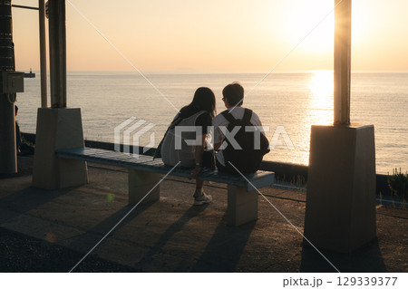 People Watching Sunset at Shimonada Station, Ehime, Japan 129339377