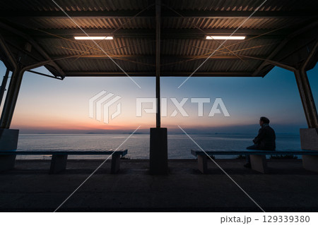 People Watching Sunset at Shimonada Station, Ehime, Japan People Watching Sunset at Shimonada Station, Ehime, Japan 129339380