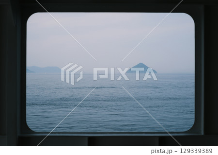Window view on a ferry in the Seto Inland Sea, Japan 129339389