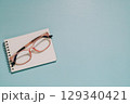 Pink Glasses on Notepad, Study, Vision and Creative Workspace 129340421