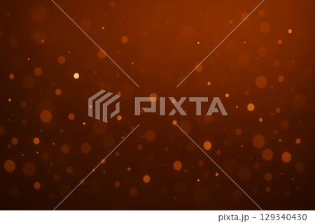 バーントオレンジにブロンズとカッパーの光が漂う背景 129340430
