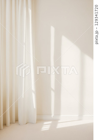 Minimalistic background with blurred shadow on pastel color wall and curtains 129341720