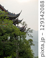 Traditional architecture among lush greenery in DuJiangYan 129342088