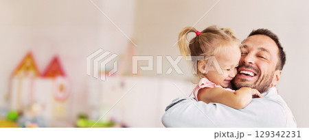 Tenderness Concept. Closeup portrait of young bearded man embracing his small child at home Tenderness Concept. Closeup portrait of young bearded man embracing his small child at home 129342231