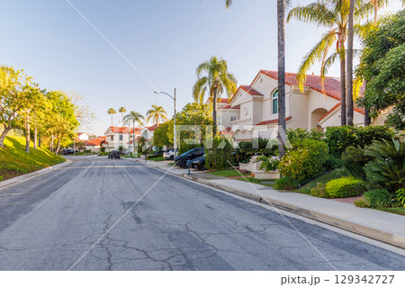 Suburban street with houses in the Los Angeles area Suburban street with houses in the Los Angeles area 129342727