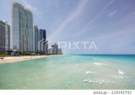 Modern skyline of Miami with towering skyscrapers, tropical vibe, and waterfront views Modern skyline of Miami with towering skyscrapers, tropical vibe, and waterfront views 129342742