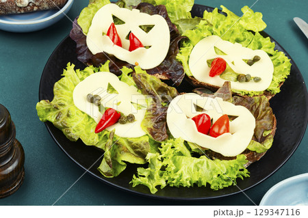 Mini sandwiches with monster faces. Mini sandwiches with monster faces. 129347116