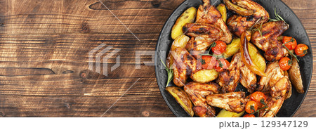 Dish of spicy chicken wings. Dish of spicy chicken wings. 129347129