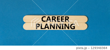 Career planning symbol. Concept words Career planning on wooden stick. Beautiful blue table blue background. Business, motivational career planning concept. Copy space. Career planning symbol. Concept words Career planning on wooden stick. Beautiful blue table blue background. Business, motivational career planning concept. Copy space. 129348364