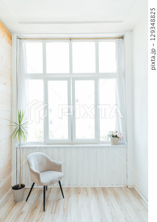 Interior of an empty room with a window 129348825