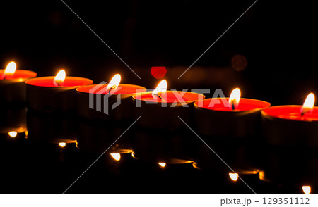 Each candle burns like a star in the night sky Each candle burns like a star in the night sky 129351112