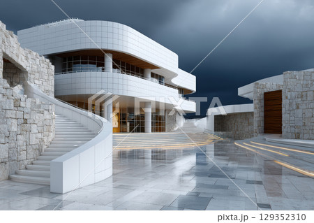 Modern museum features abstract architecture with curved design 129352310