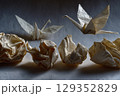 Transformation of crumpled paper into origami crane sequence 129352829