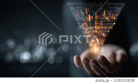 Hands present a marketing funnel with digital data overlay 129352839