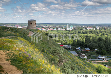 The tower of an ancient Bulgarian fortress on a high cliff on the banks of the Kama River, Elabuga, Tatarstan, Russian Federation The tower of an ancient Bulgarian fortress on a high cliff on the banks of the Kama River, Elabuga, Tatarstan, Russian Federation 129356576
