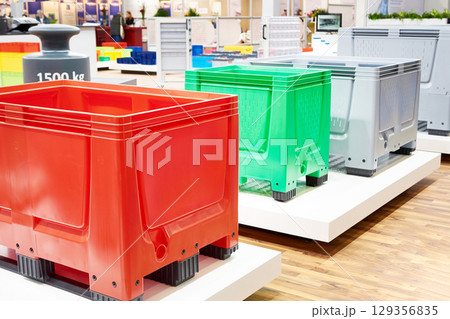 Color plastic boxes in hardware store 129356835