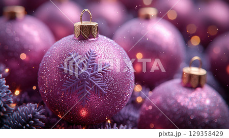 Christmas pink balls golden snowflakes. Flat lay, copy space, purple background, Christmas, New Year Christmas pink balls golden snowflakes. Flat lay, copy space, purple background, Christmas, New Year 129358429