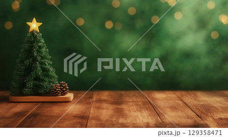 Christmas bokeh background, wooden table, miniature green Christmas tree Christmas bokeh background, wooden table, miniature green Christmas tree 129358471