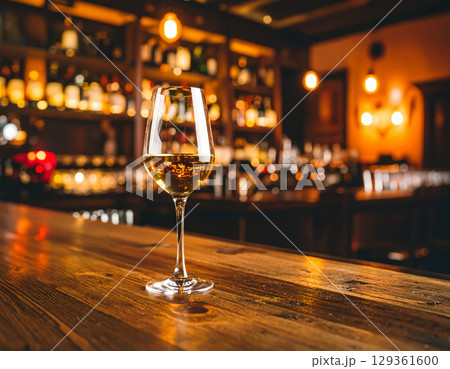 glass of red wine on the bar counter glass of red wine on the bar counter 129361600
