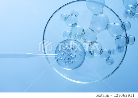 Abstract cosmetic laboratory. Chemical laboratory research. Cosmetic Essence. Bubbles in Petri Dish Abstract cosmetic laboratory. Chemical laboratory research. Cosmetic Essence. Bubbles in Petri Dish 129362911