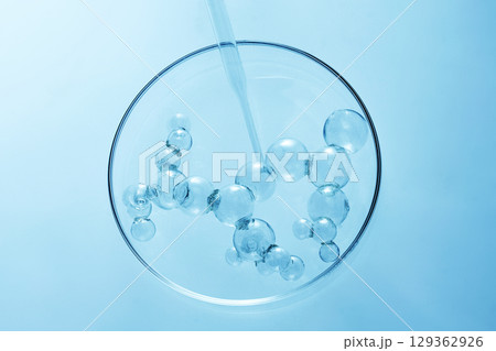 Abstract cosmetic laboratory. Chemical laboratory research. Cosmetic Essence. Bubbles in Petri Dish 129362926